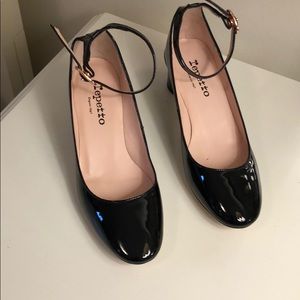 Black patent leather heels with ankle strap